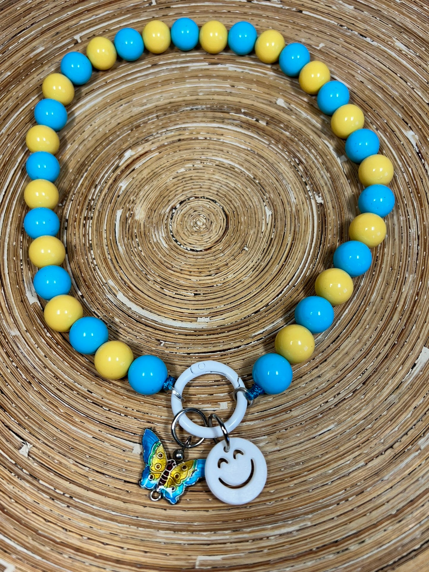 Ketting Big Beads geel turquoise vlinder 14 mm