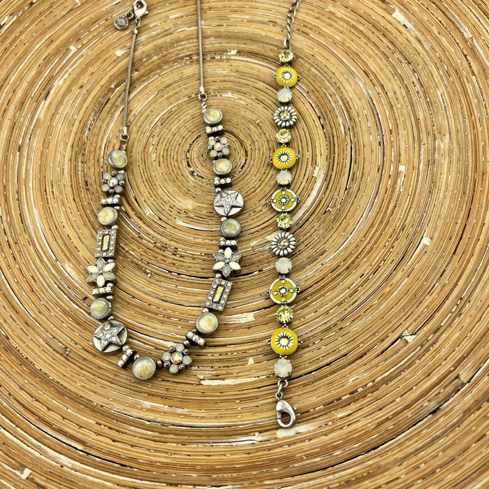 Set ketting en armband geel