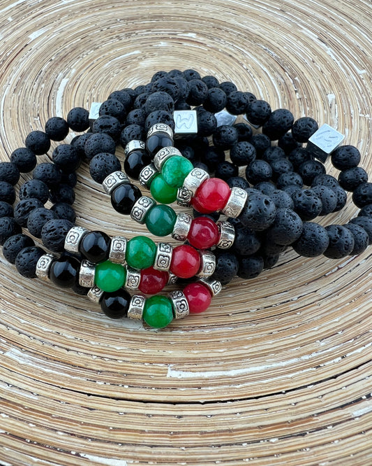 N.E.C. armband van jade en lavasteen in rood, groen en zwart. Voor geluk, kracht en echte clubtrots, dicht bij jouw hart.