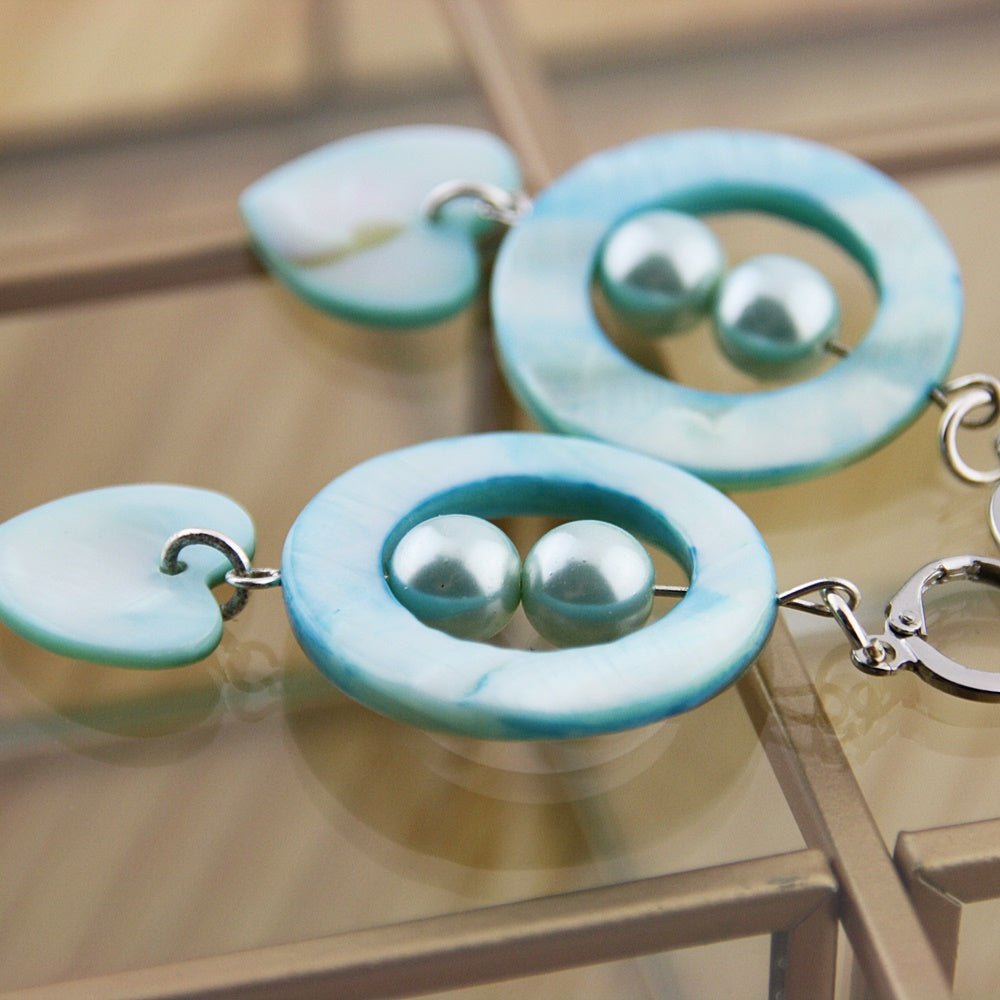 Oorbellen: schelp blauw harten - HanneHaves