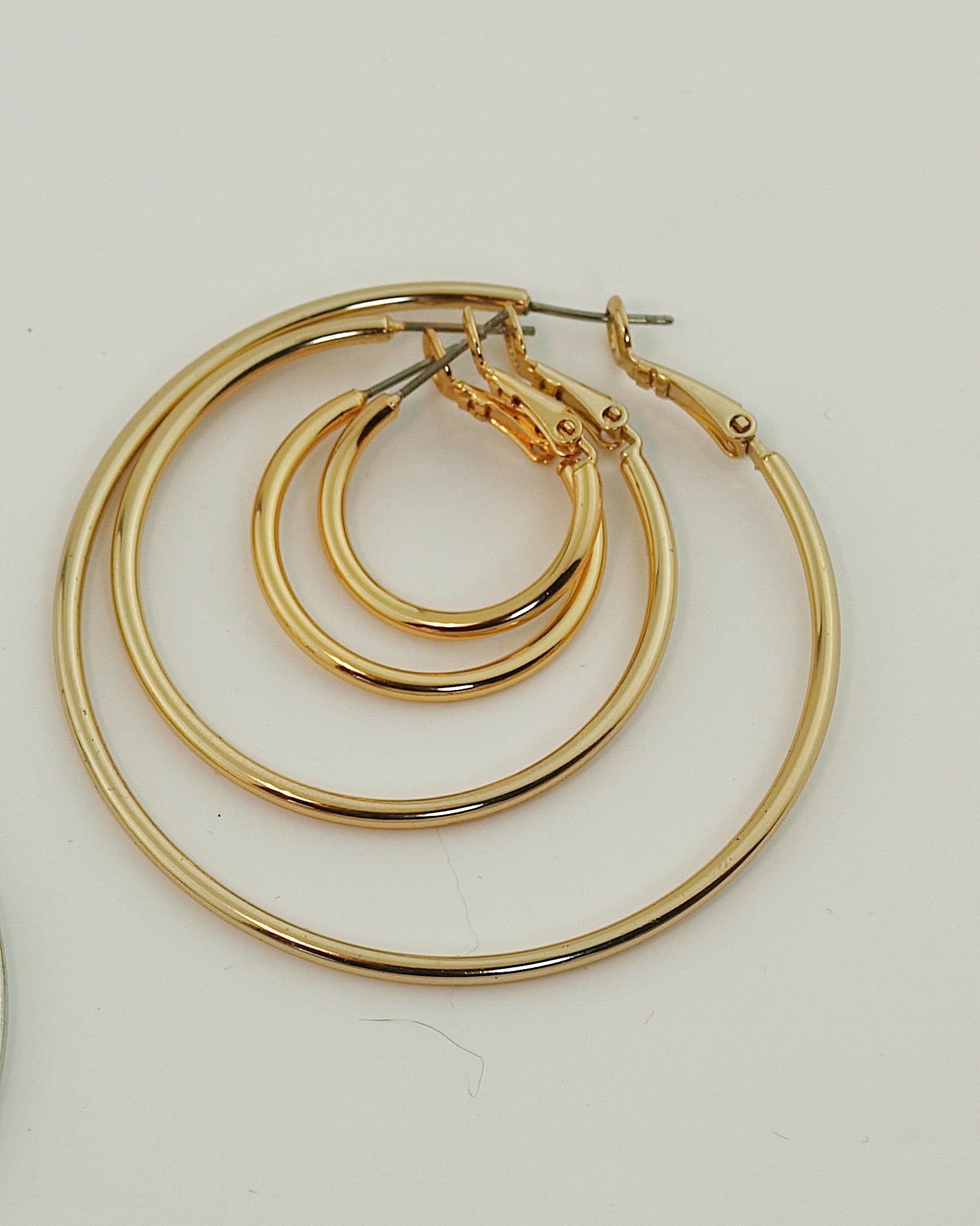 Oorbellen Triple Hart Goud – Ladylike Fashion Oorbellen Triple Hart Goud – Ladylike Fashion