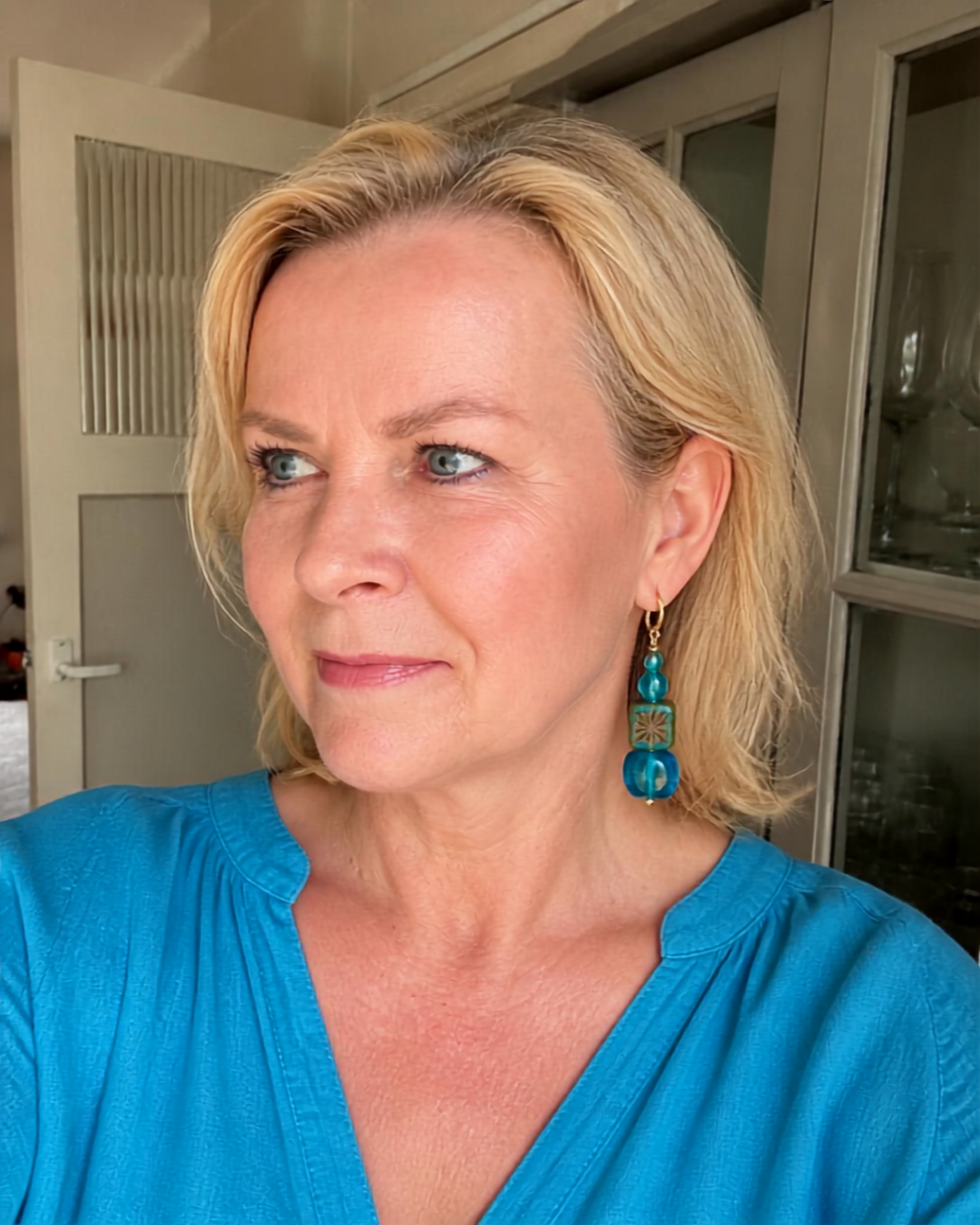 Oorbellen Turquoise bloemdetail