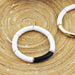 Armband Tube in wit met zwart en goud